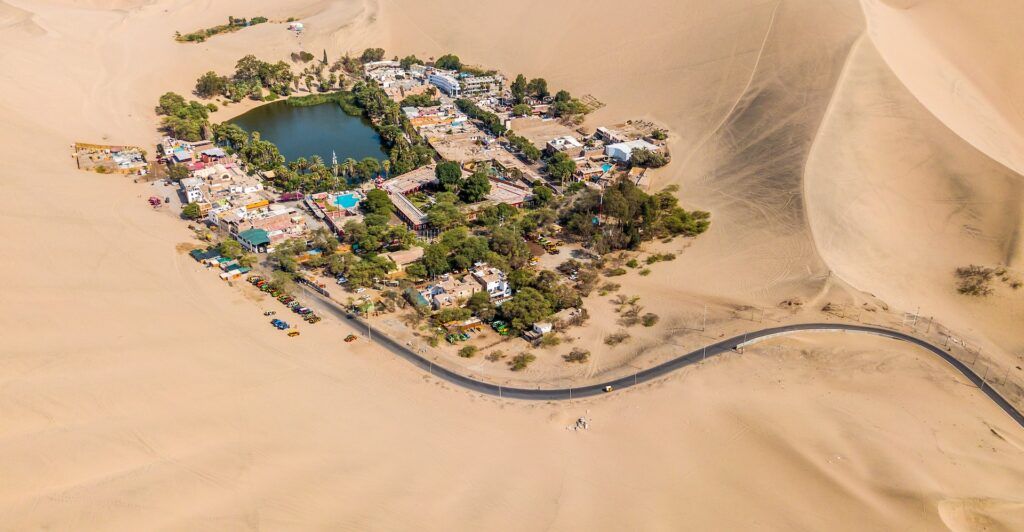 Aerial photo of vHuacachina illage in the middle of the desert