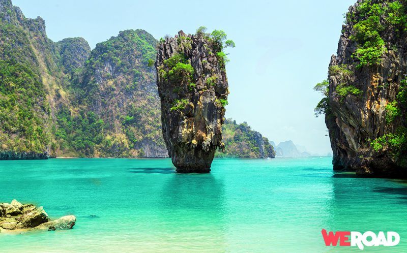 brown rocks in the turquoise sea, one of the best things to see in Thailand