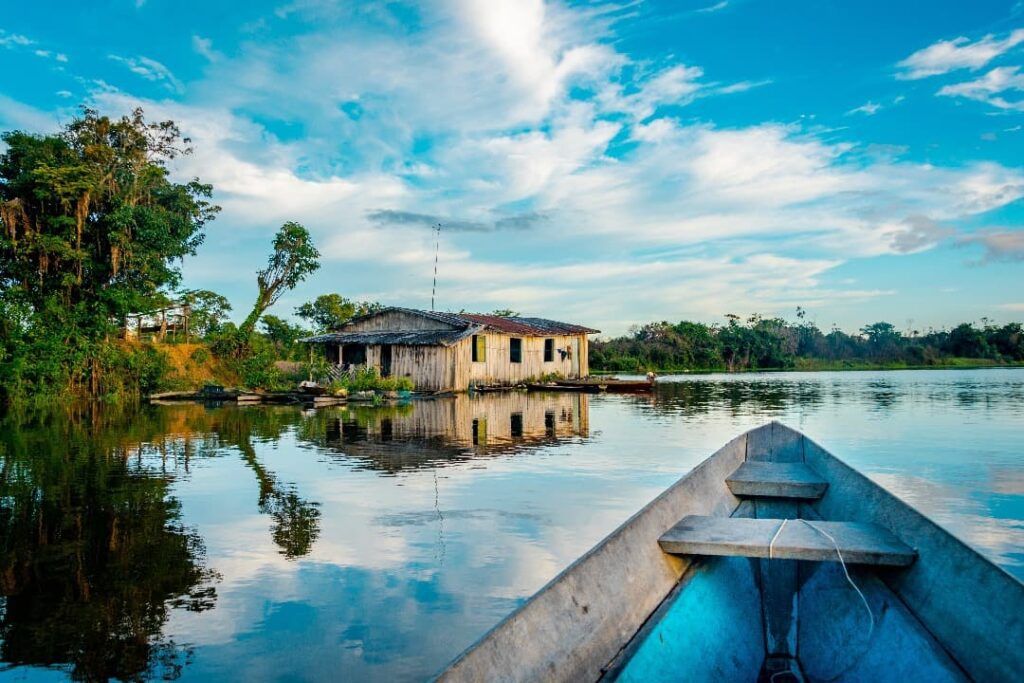 Boat and house on Amazon river
