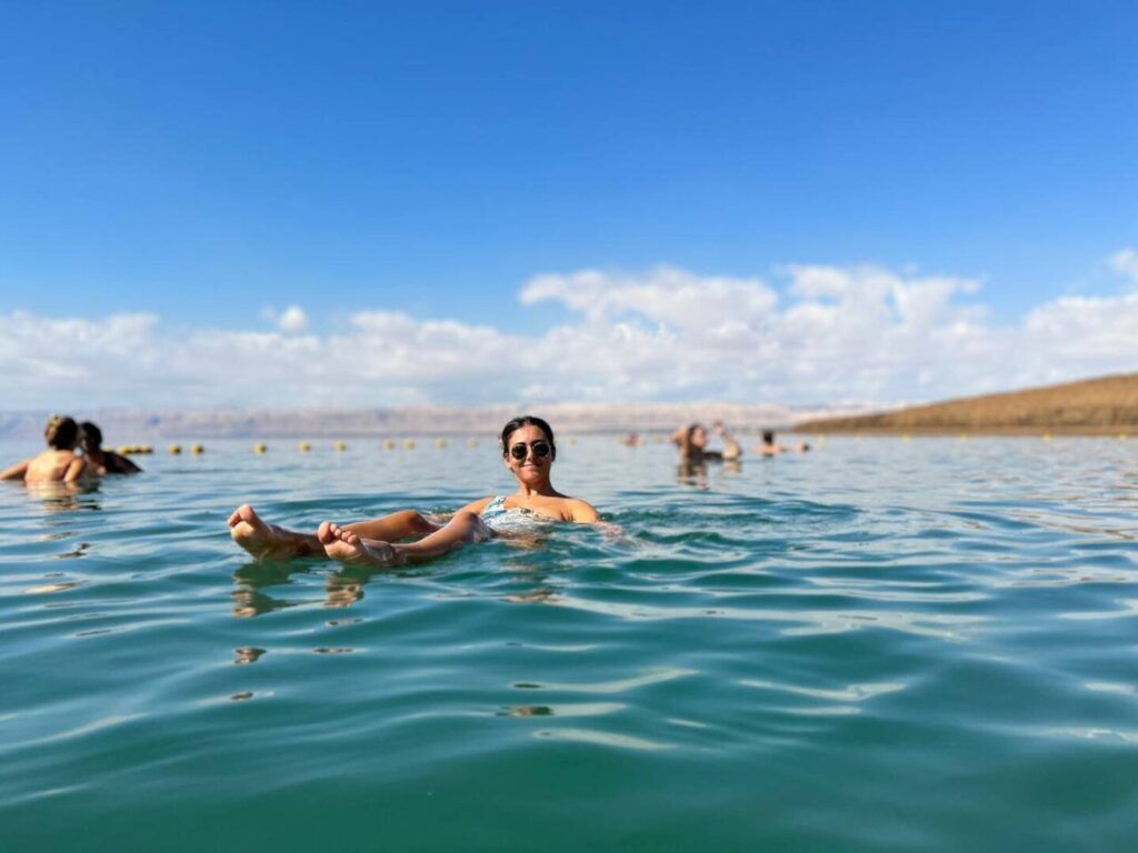 Woman floating in the dead sea