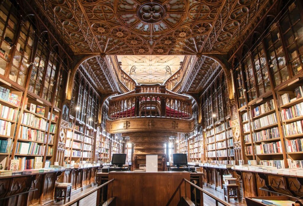library shelves inside Lello Bookstore in Lisbon
