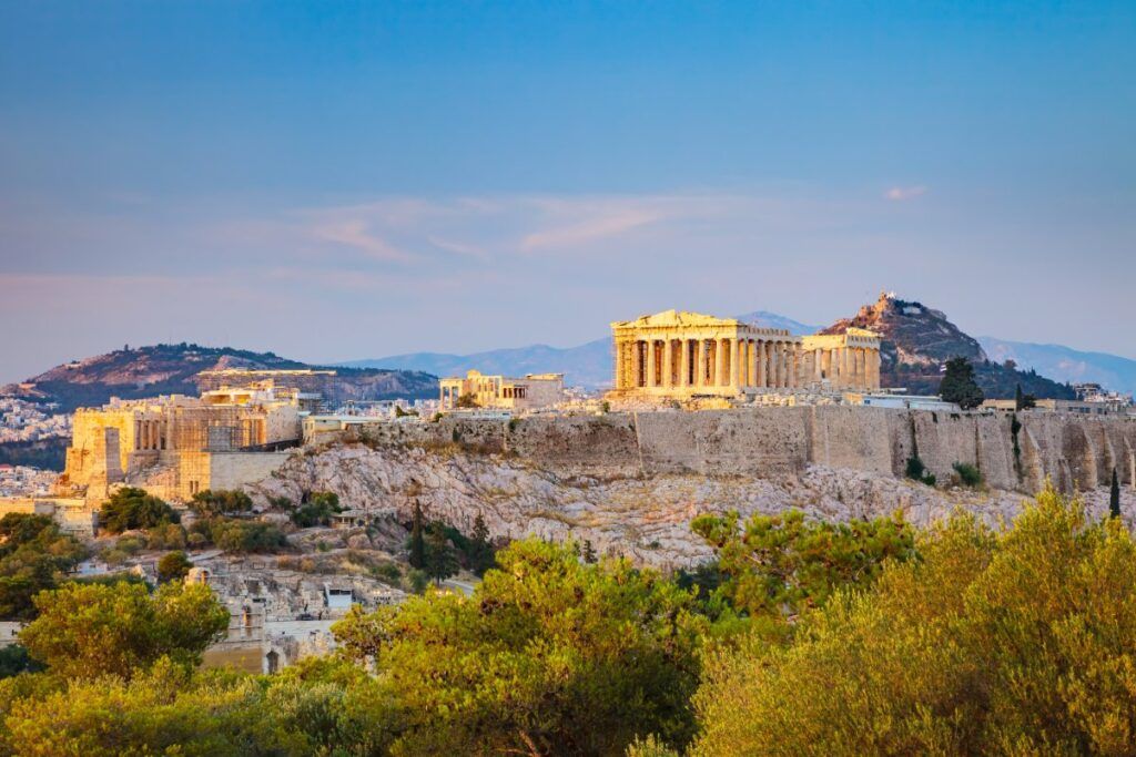 the ruins of the Acropolis of Athens at sunset