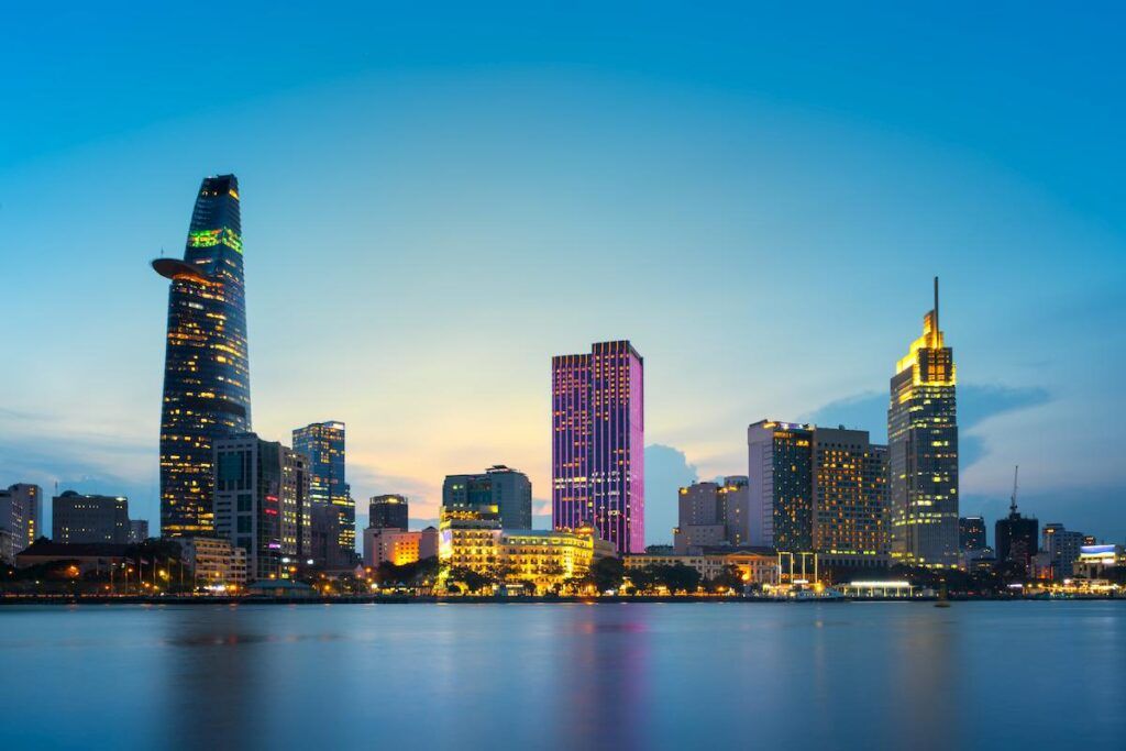 skyscrapers lit up at dusk