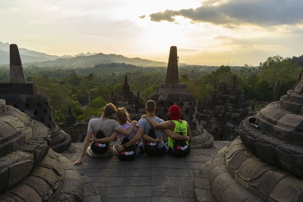 A group of WeRoaders enjoying a beautiful sunset at the Borobudur temple