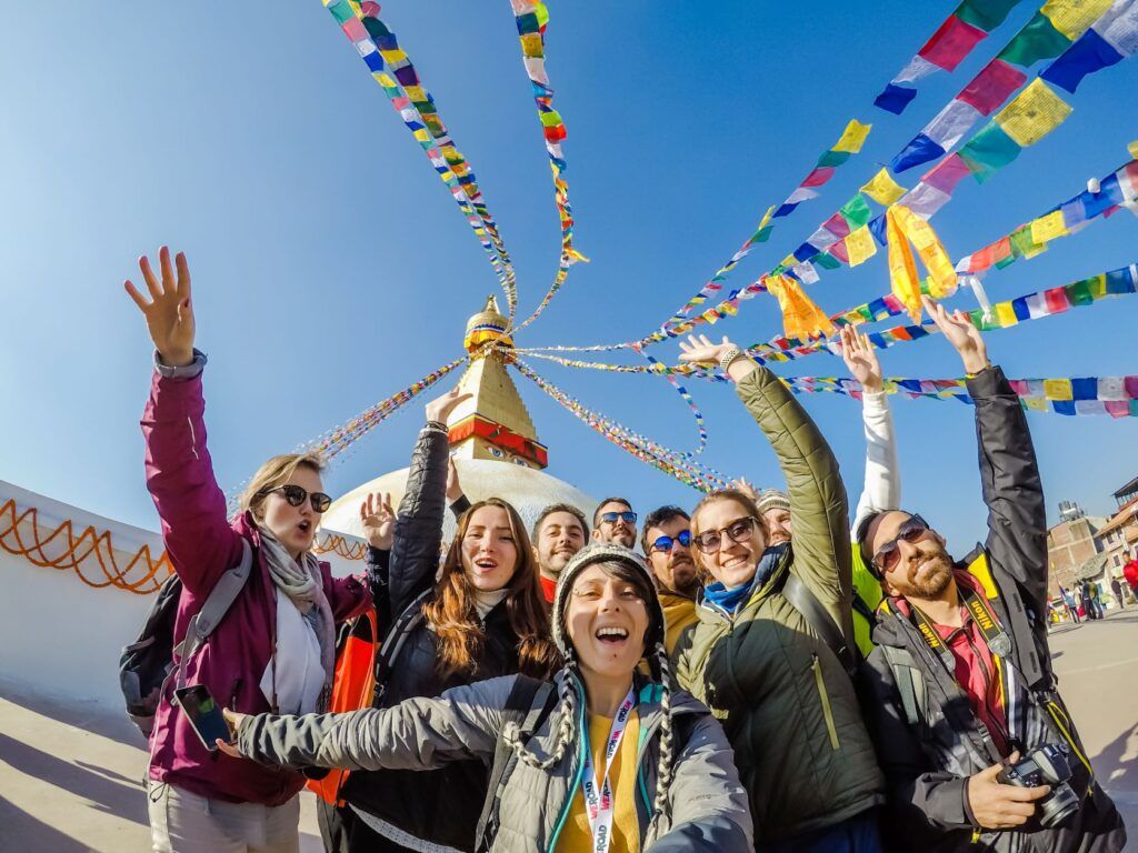 A group of people smiles in Nepal
