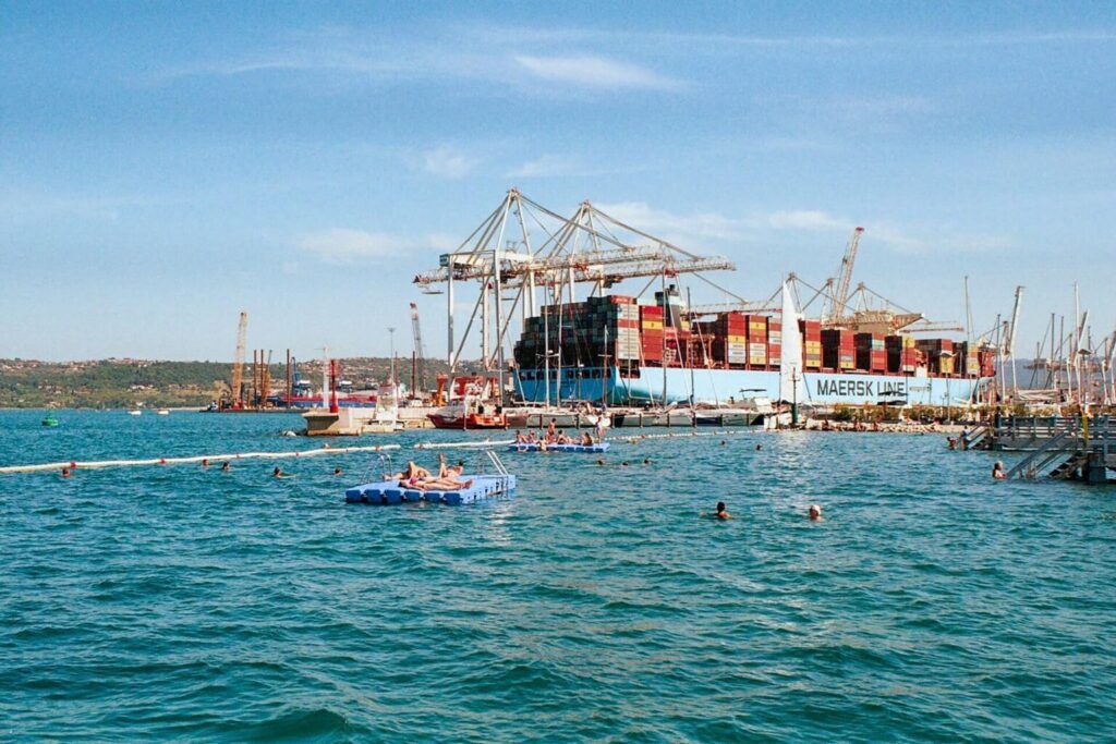 People bathing in the port of Koper.