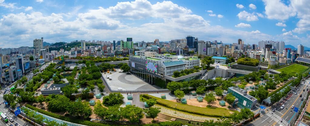 Aerial view of the city buildings during the day.