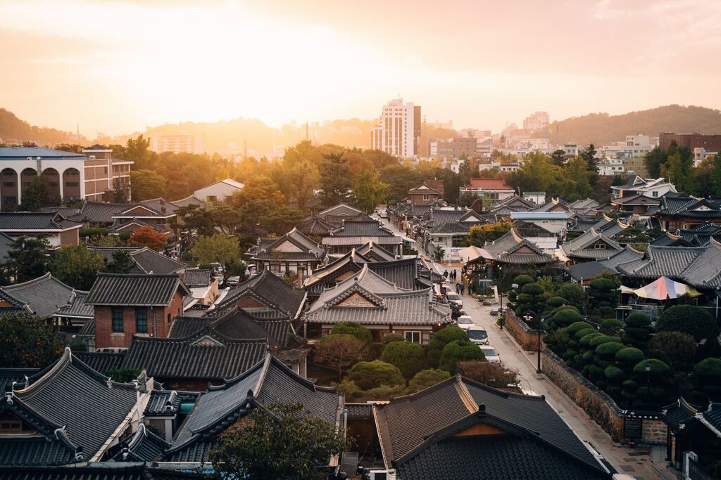 Aerial photograph of houses during the golden hour.