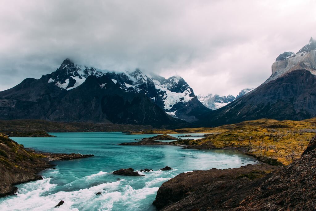 Sheet of water surrounded by mountains