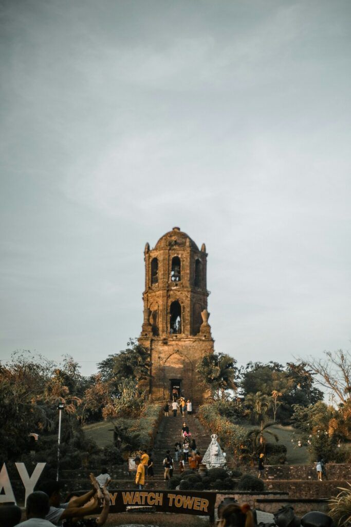 trees near brown concrete temple.