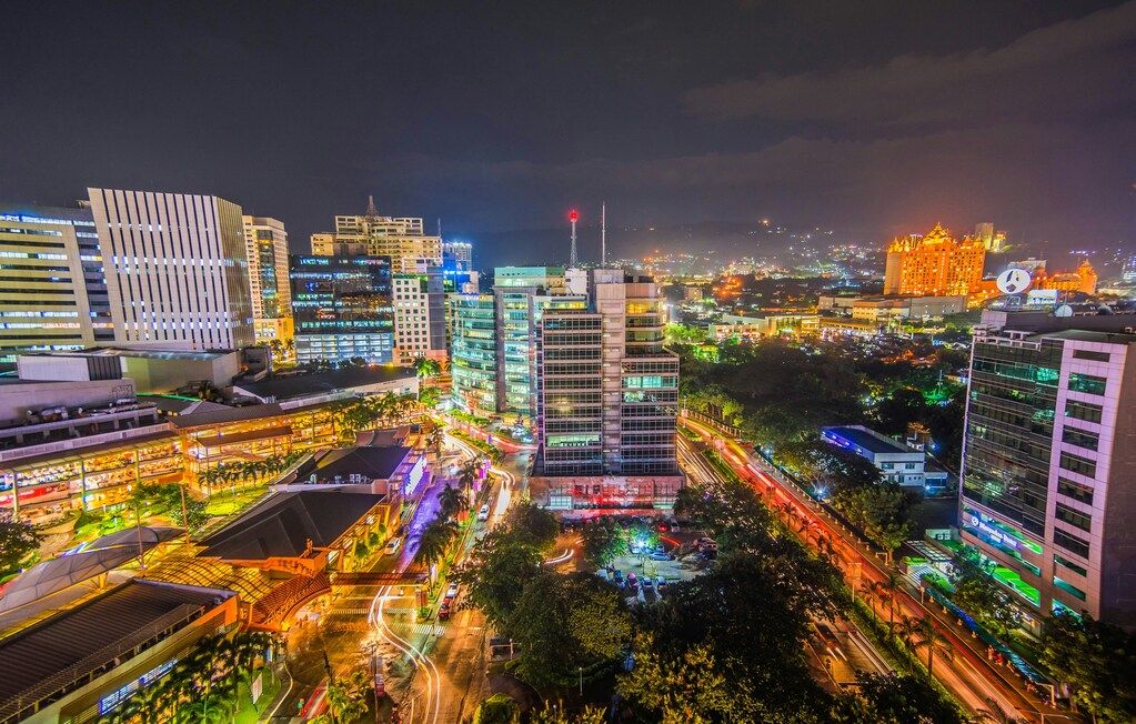 long-exposure photo of urban city with lights.