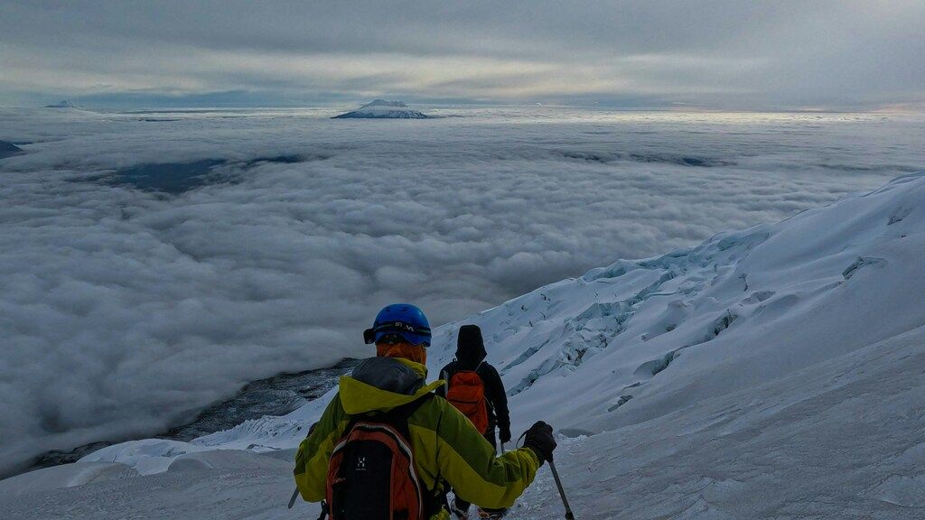 Mountaineers trekking through the snowy landscapes of Patagonia.

