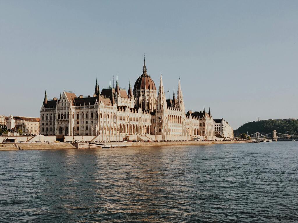 The grand Hungarian Parliament Building standing majestically on the banks of the Danube River in Budapest.