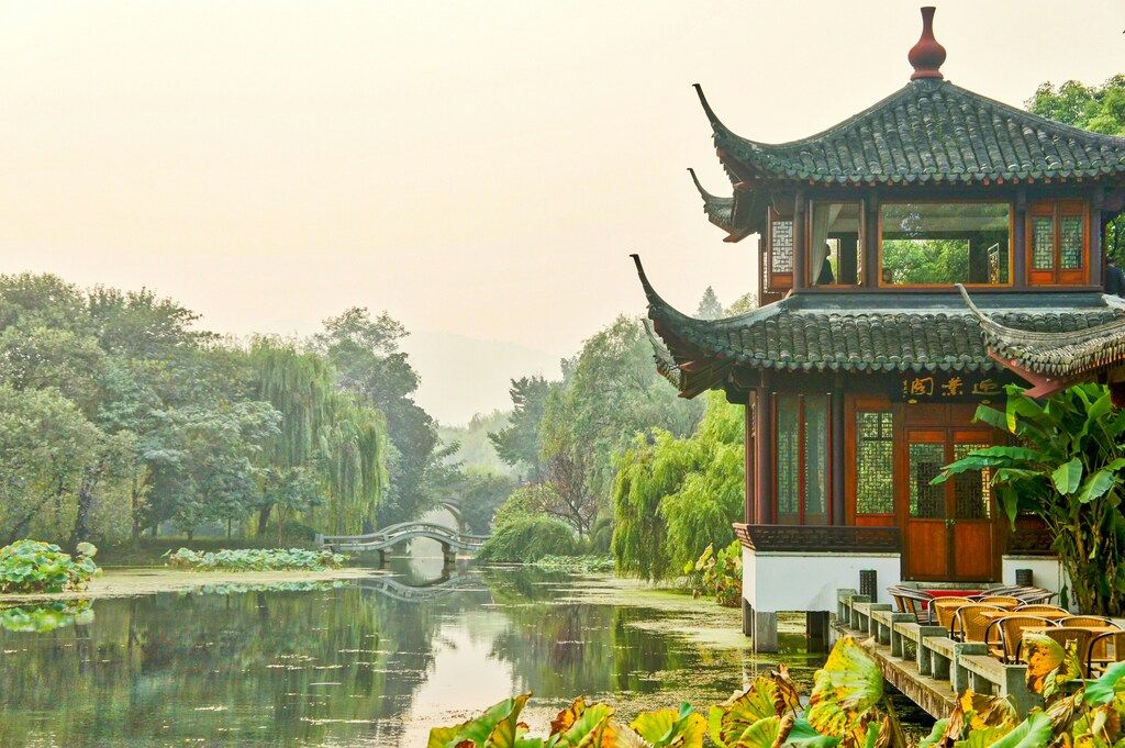 Traditional Chinese garden pavilion by the water in Hangzhou, near West Lake.