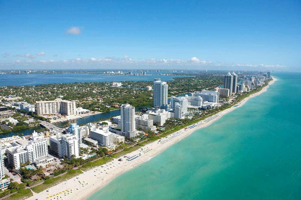 Aerial view of Miami Beach with white sand and modern skyline, Florida, USA