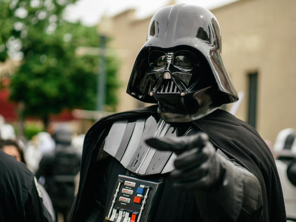 Darth Vader in costume at a public event.