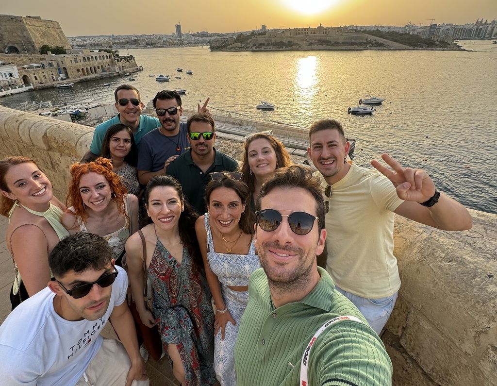 WeRoad group trip in Malta with sunset view over Valletta