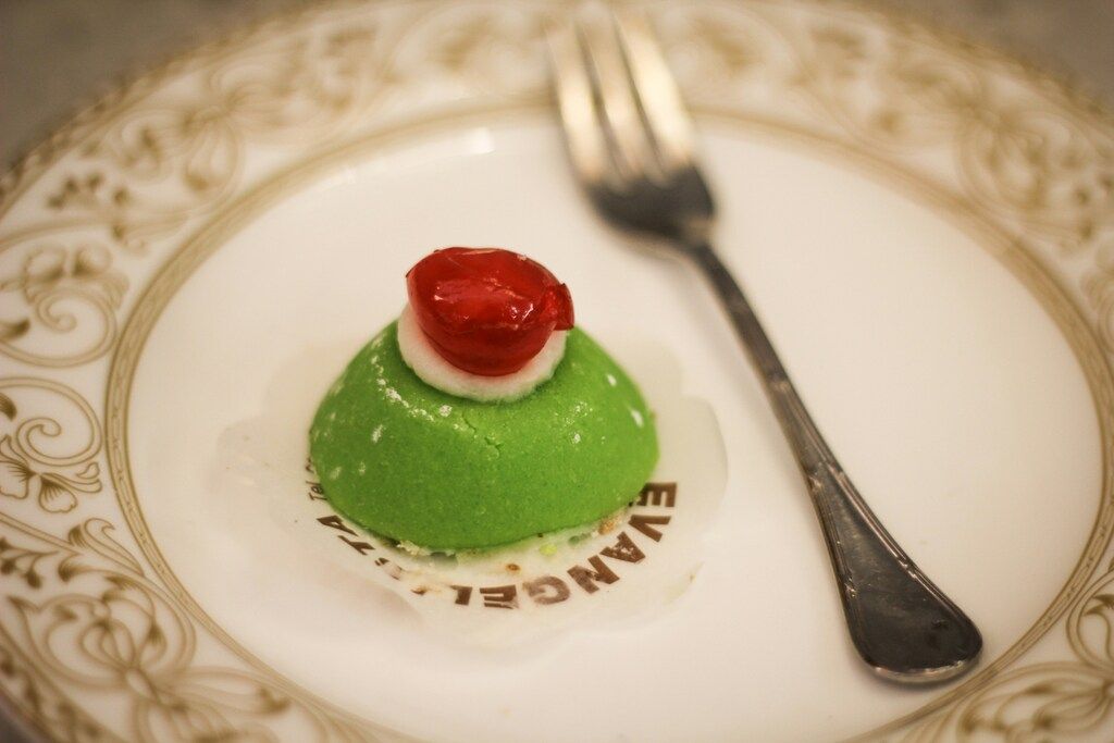 Sicilian cassata dessert with green marzipan and candied cherry