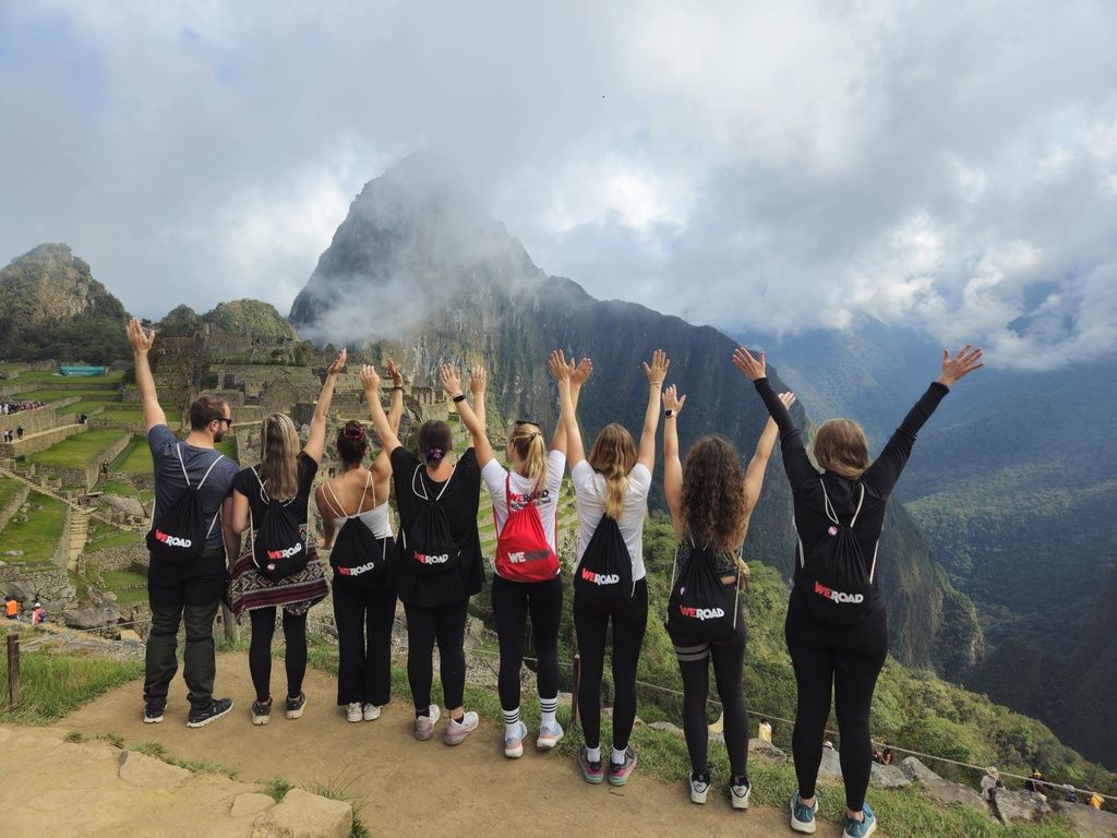 group of WeRoad travellers in Machu Picchu, Peru