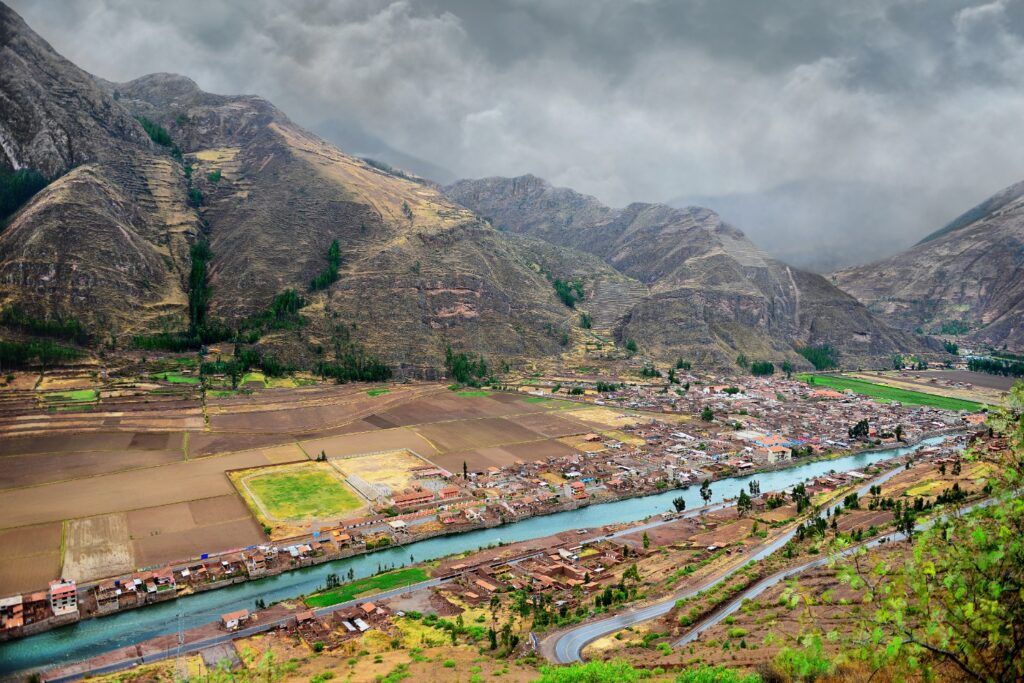 Panoramic view of the Urubamba River flowing through the Sacred Valley town.