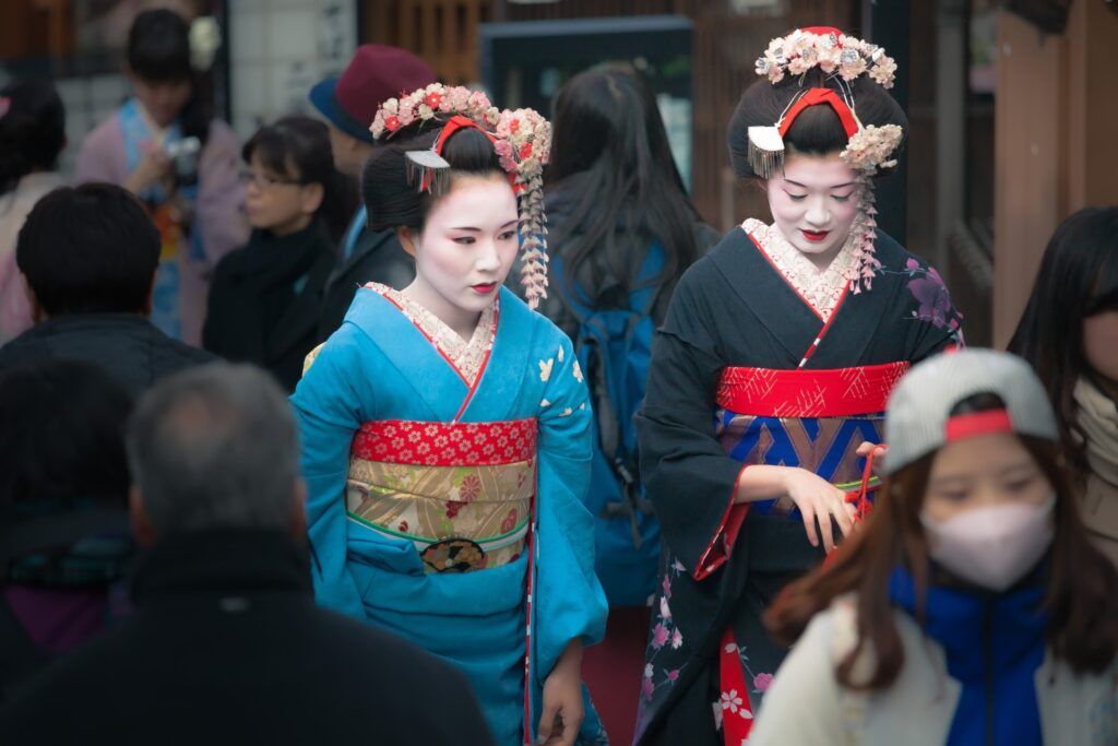 Two Maiko (apprentice Geisha) walking in the Gion district.
