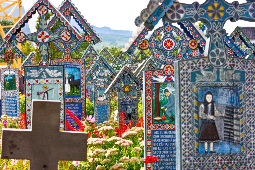 Colorful hand-painted wooden crosses at the Merry Cemetery in Săpânța.
