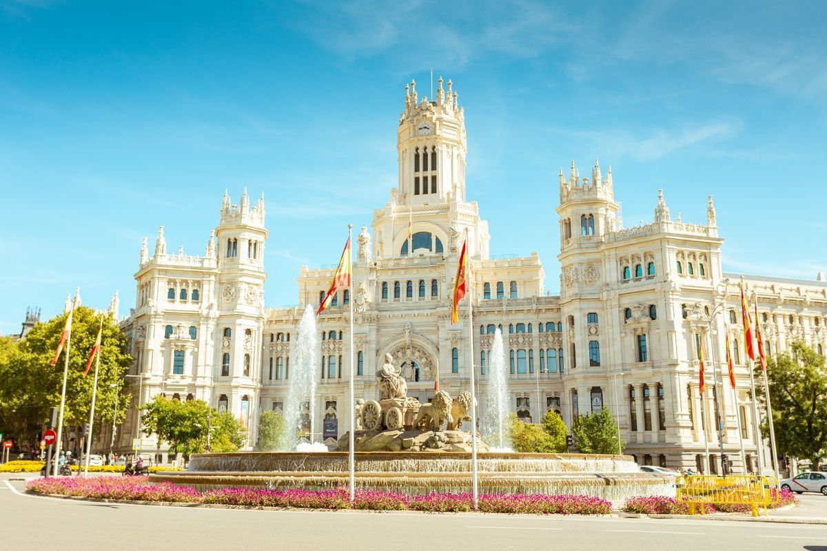 Cibeles Fountain in front of Madrid City Hall under a clear blue sky