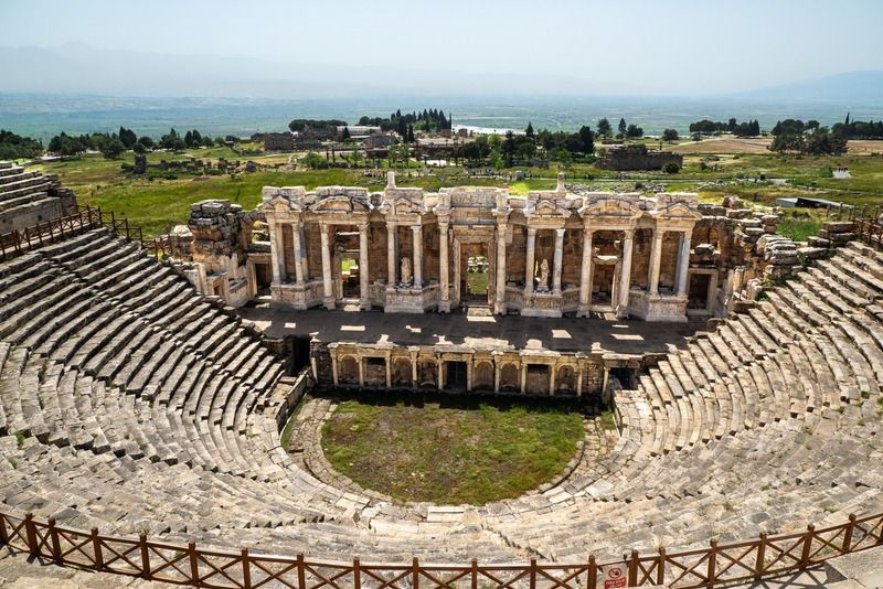 Roman amphitheater of Hierapolis with well-preserved stone tiers and colonnade near Pamukkale