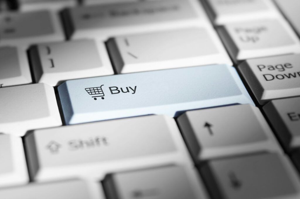 Keyboard with a highlighted Buy key for online shopping