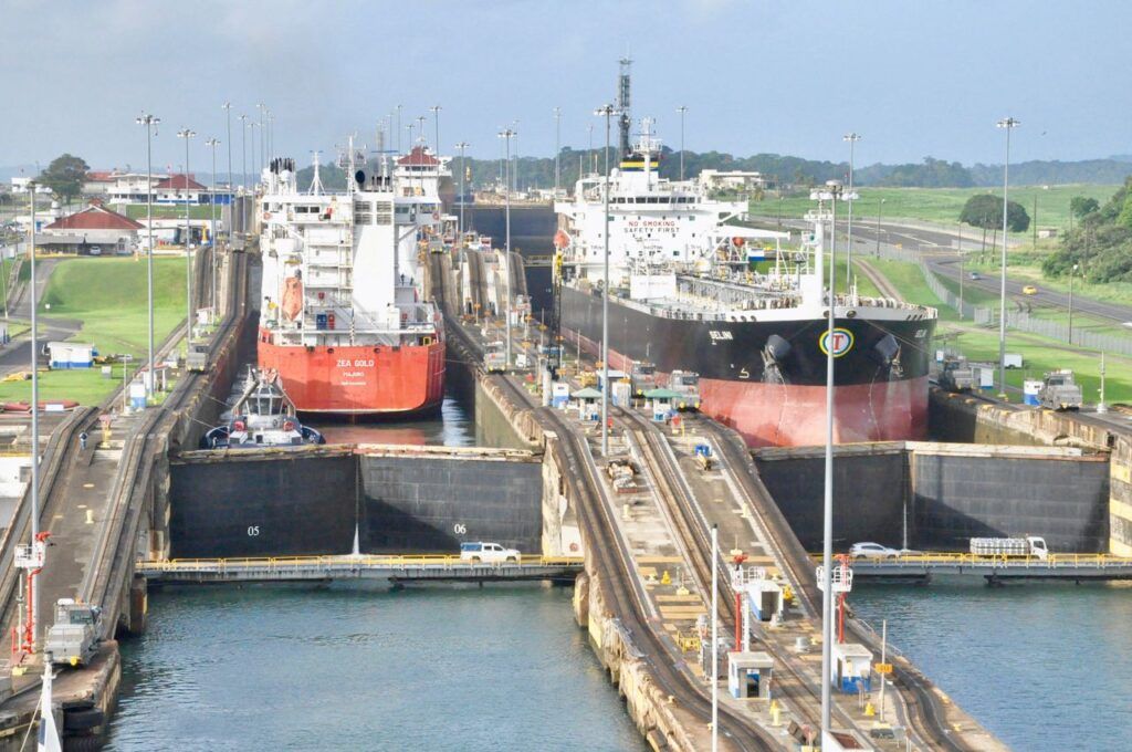 Cargo ships moving through the locks of the Panama Canal
